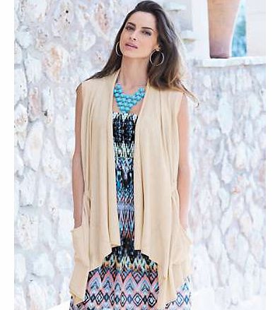 Sleeveless Summer cardigan that can be layered over maxi dresses, jeans and linens for a versatile outfit builder. The crochet detail to the back adds the designed to be different element. Complete with slouch pockets and a flowing waterfall front. C