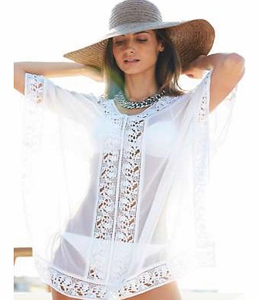 Simple and elegant, this kaftan with crochet trim is a great holiday cover-up. Easy wear shape and flattering fit, a must-have holiday cover-up. Kaftan Features: Washable 100% Polyester Length approx. 77 cm (30 ins) This item is part of our exclusive