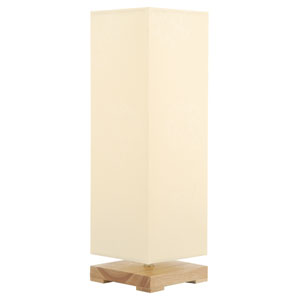 Short, square wooden base, topped with a cream column shade, with circular clusters of semi-transpar