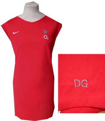 This unique item is the popular sleeveless airtex top favoured by the players. The top was issued to
