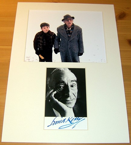 Signed photograph of David Kelly mounted alongside another colour photograph from the movie Charlie