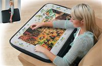 Unzip the deluxe Porta Puzzle 1000, it has padded non-slip surfaces and two additional separate
