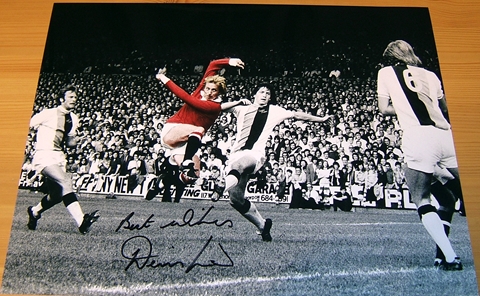 Exceptional glossy colour photograph signed by Denis Law. Certificate Of Authenticity no