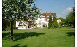 Enjoy the combination of good food and good companywith this dinner for two at Manor House Hotel. Youll discover a friendly and peaceful atmosphere at this attractive Surrey hotel, and youll be delighted as you tuck in to three courses of tasty fo
