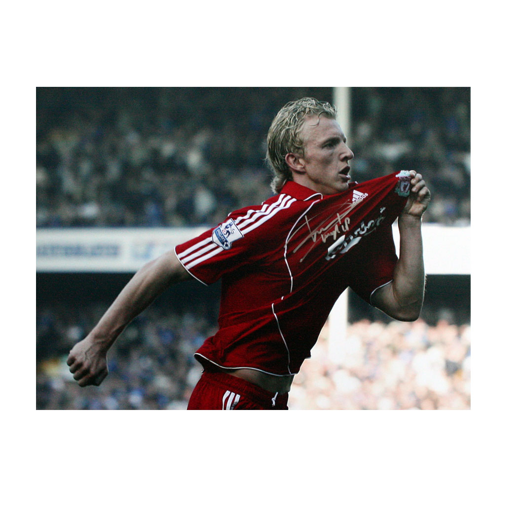 This photograph shows Dirk Kuyt celebrating his second goal in the Merseyside derby at Everton.  Kuy