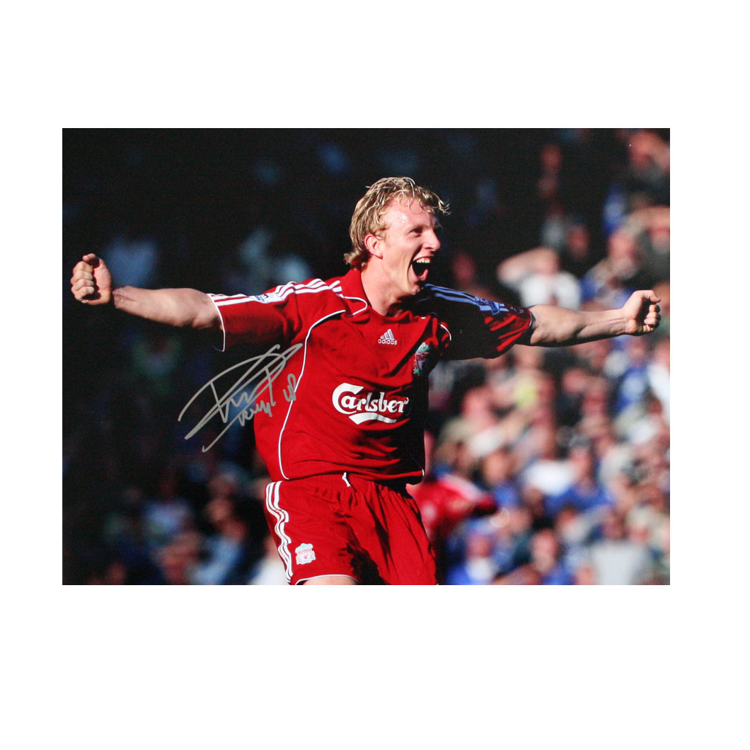This photo shows Dirk Kuyt celebrating at the final whistle after scoring the winning goal from the 