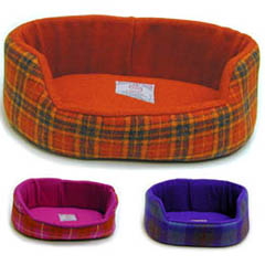 Handwoven in the Outer Hebrides, this Harris Tweed bed will ensure that your best friend has the com