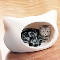 Provide a secure, warm sleeping area for your cat with this elegant cat bed.  It