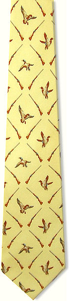 A yellow silk hunting tie featuring ducks and guns.