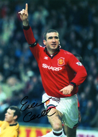 Eric Cantona has signed this superb glossy colour photograph in black pen. Certificate Of