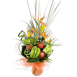 A modern and flamboyant handtied display of tropical flowers and foliages ideal for the modern home 