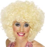 Dolly Parton style curly blonde wig.
