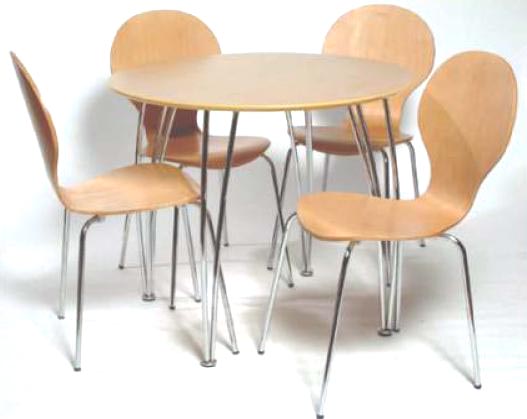 An attractive chrome and beech circular dining table with four moulded dining chairs.   A great