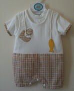 "Dungarees" are half white with applique fisherman with the fish he has cau