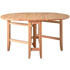 Versatile gate leg table in solid natural beech. The gate-leg action can support one or both extensi