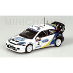 A 1/43 scale replica of the Ford Focus RS WRC raced by Martin and Park on the 2003 Argentina Rally