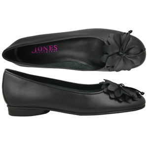 A formal pump from Jones Bootmaker. Features decorative leather flower to the toe, slight heel and a
