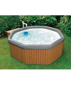 Portable hot tub includes hard top cover, chemical kit, aromatherapy system and filters. Weight 100k