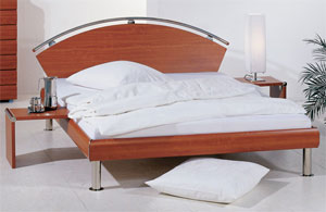 The Hasena Motril has the following features: Grado legs and Tempio headboard Bed in Cherry and