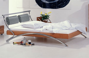 The Hasena Nerja has the following features: Assisi legs and Assisi headboard in a chrome finish