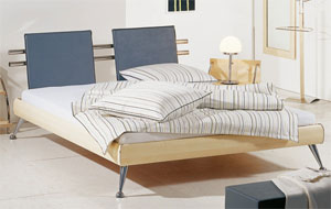 The Hasena Teulada has the following features: Soko legs and Panele headboard both in alugloss Bed