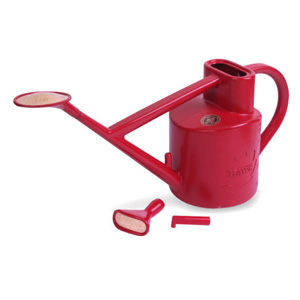 A quality  blow moulded  6 litre plastic watering can  featuring an oval brass face rose  plastic do
