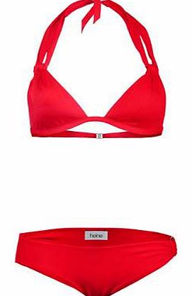 Bikini with decorative rings on the briefs and shoulder straps with a twist effect. Soft cups and lined brief. Heine Bikini Features: Washable 80% Polyamide, 20% Elastane Lining: Polyamide