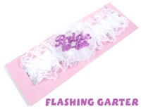 Flash a little leg and show them your flashing garter. A garter is a traditional gift for the bride