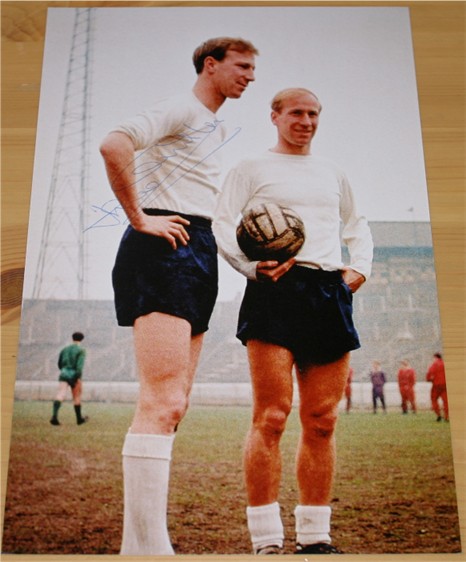 Signed in blue pen by Jack Charlton (pictured with his brother Bobby). COA - 0420000450