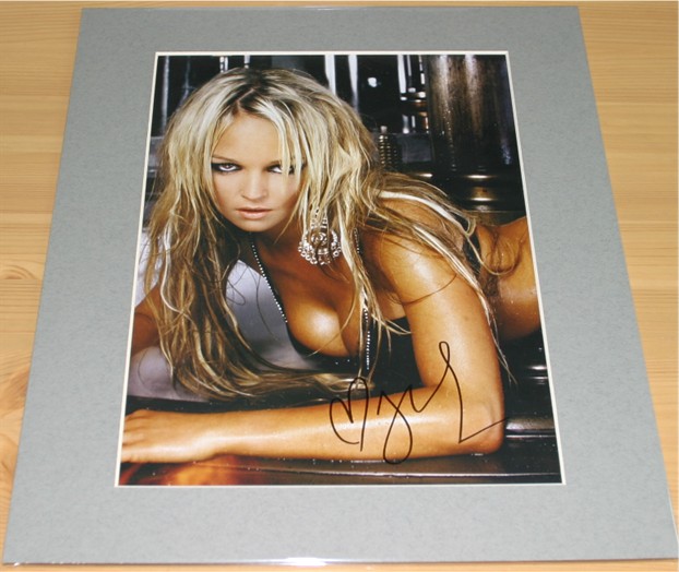 Signed in black pen by the lovely and talented Jennifer Ellison. The item has been professionally