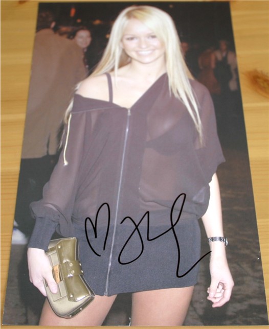 Signed in black pen by the lovely and talented Jennifer Ellison.  COA - 0600000173