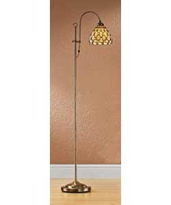 Antique brass finish lamp with amber and cream Tiffany style shade.Foot switch.Height 164cm.Shade
