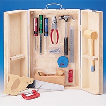A three winged wooden cabinet with real working tools
