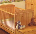 karol cot bed in solid pine ,suitable from birth to toddler  with teething rails to protect the cot