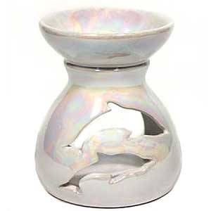 A large oil burner designed as a white Dolphine - Our oil burners offer a simple way to put our