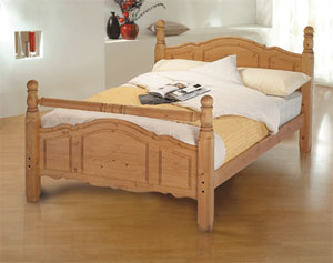 Solid Scandinavian pine bedstead Chunky bolster rail bed with deep sculptured panel design Solid