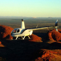 This amazing helicopter flight takes you over Australia's Red Centre to a place where a vast sal