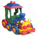 Brightly coloured pull along train. Fun for little