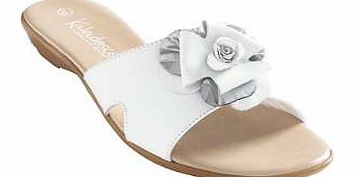 Simple Italian made sandals with low scoop wedge heel and flower front with a silver tone leaf trim. Padded underfoot for extra comfort. Sandals Features: Upper: Leather Lining/sock/sole: Other materials Heel height approx. 2.5 cm (1 ins)