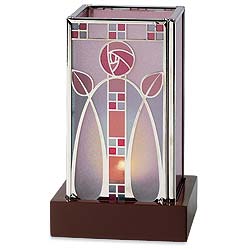 Our stained glass tealight lamp incorporates a rose and tulip design based on those created by
