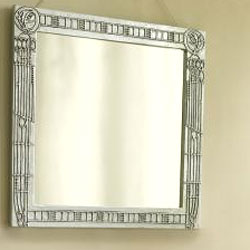 Created exclusively for Past Times, this mirror has a silver-effect polyresin frame decorated with
