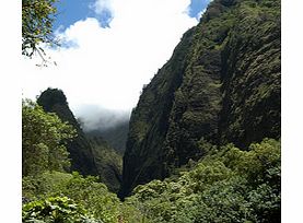 This Hawaii tour will take you to Mauis famous dormant volcano, the spectacular House of the Sun, Mount Haleakala Crater. Also see the unique rocky pinnacle known as the Iao Needle and historic Wailuku Town.