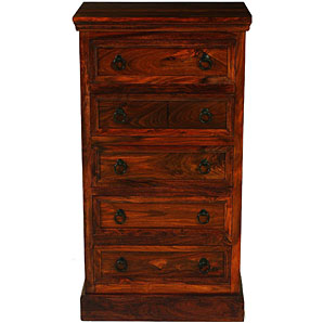A tall, five-drawer chest with a rustic design, pa