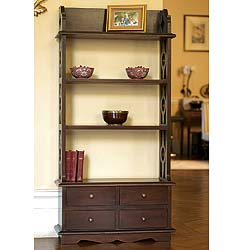 A stylish display area for books, china, glass and other collections, this bookcase is crafted from