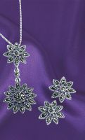 Includes Marcasite Flower Pendant and Marcasite Flower Earrings. You save £5 by ordering them as a