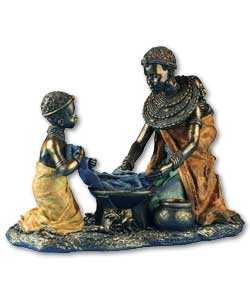 Cold cast figurine.Mother adn girl washing clothes.Size (H)22, (W)30, (D)17cm. Colour gift boxed