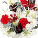 Scented white Freesia, Asiatic Lily, cream Chrysanthemums & Spray Carnations are punctuated with
