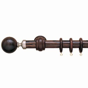 30mm curtain pole in walnut finish with a pewter e