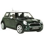 A collector quality diecast replica of the BMW Mini Cooper in green. Features include working