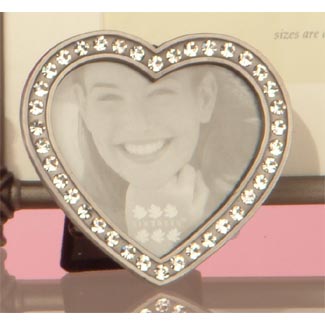 A mini heart pewter frames with jewels around the outside